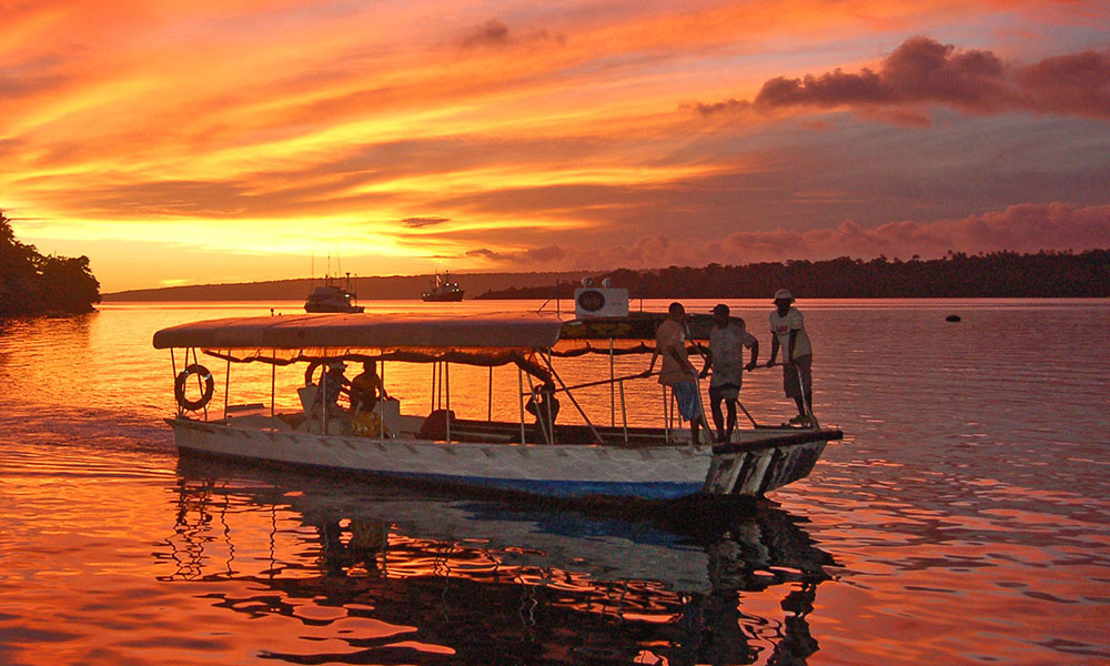 A local ferry at sunset